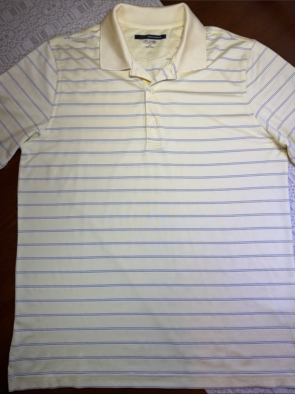 Men’s Greg Norman Play Dry Pale Yellow Polo Shirt
